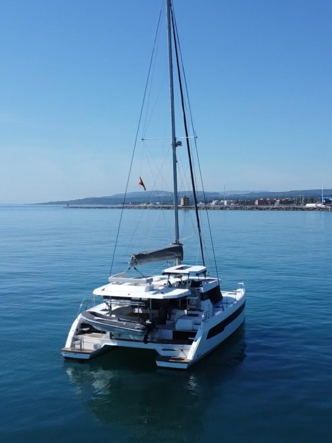 KOSMOS catamaran from above with Rock of Gibraltar in the background